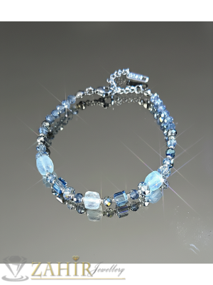  Изящна хендмейд гривна с луксозни сини  кристали, естествени камъни син аквамарин 6 мм,  стоманени детайли и накрайници, регулируем размер 17-22 см  - V1216